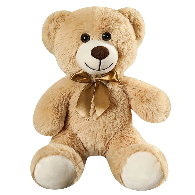 Urso de pelúcia fofo e colorido com gravata borboleta.